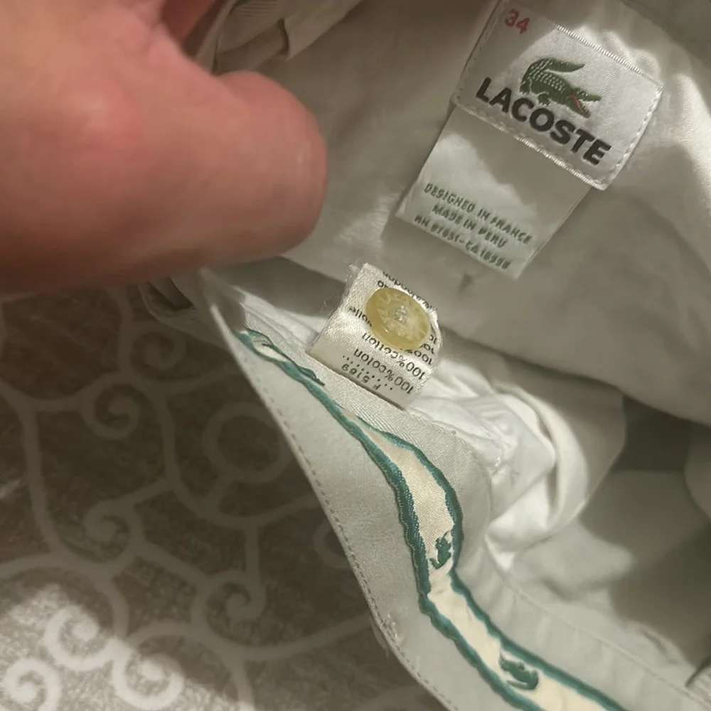 mens lacoste pleated shorts sz 34